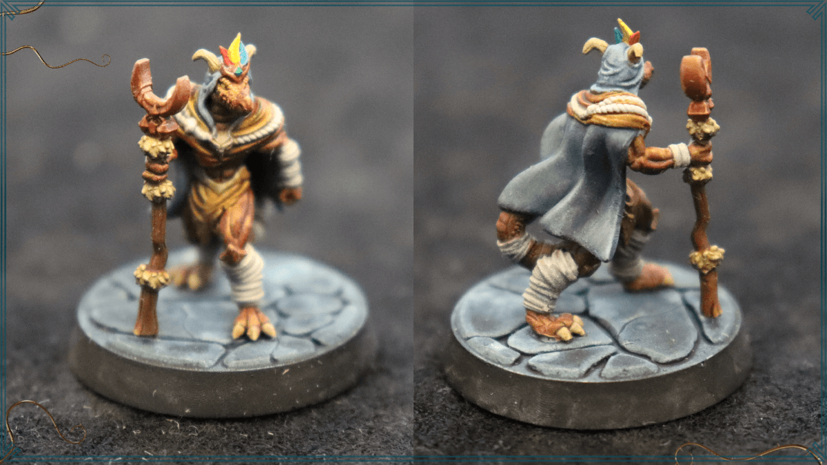 A small painted kobold cleric D&D miniature holding a wooden staff. Used to represent the Antiqua, Parvus, in the UK D&D Actual play series, Natural Six.