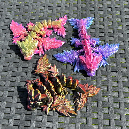 3 Tiny Crystal Dragons, 3D printed in various colours of PLA filament
