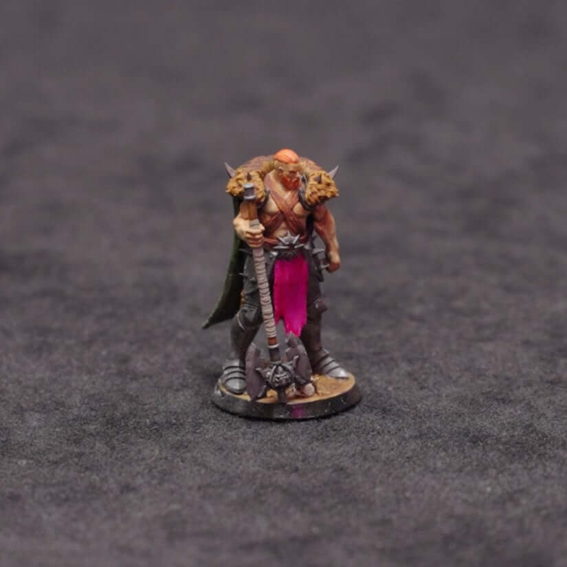 A front view of a barbarian miniature used to represent Caelen Grenweard in the UK D&D actual play series, Natural Six