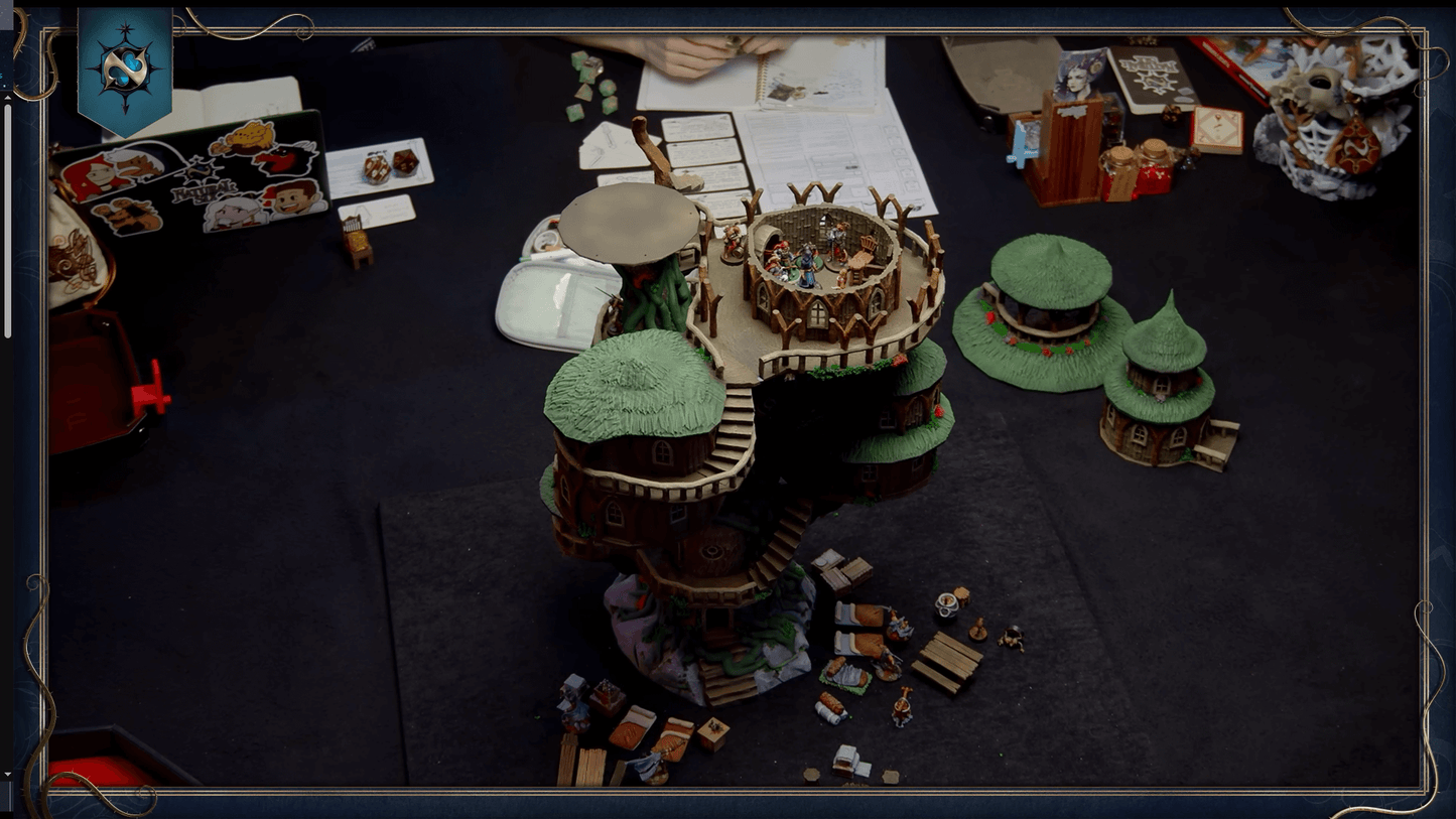 A top down screenshot of the grand treehouse in use on the UK D&D actual play series, Natural Six. It shows the interior of the 3rd highest room, containing a variety of D&D miniatures.